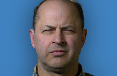 person with an eye closure expression